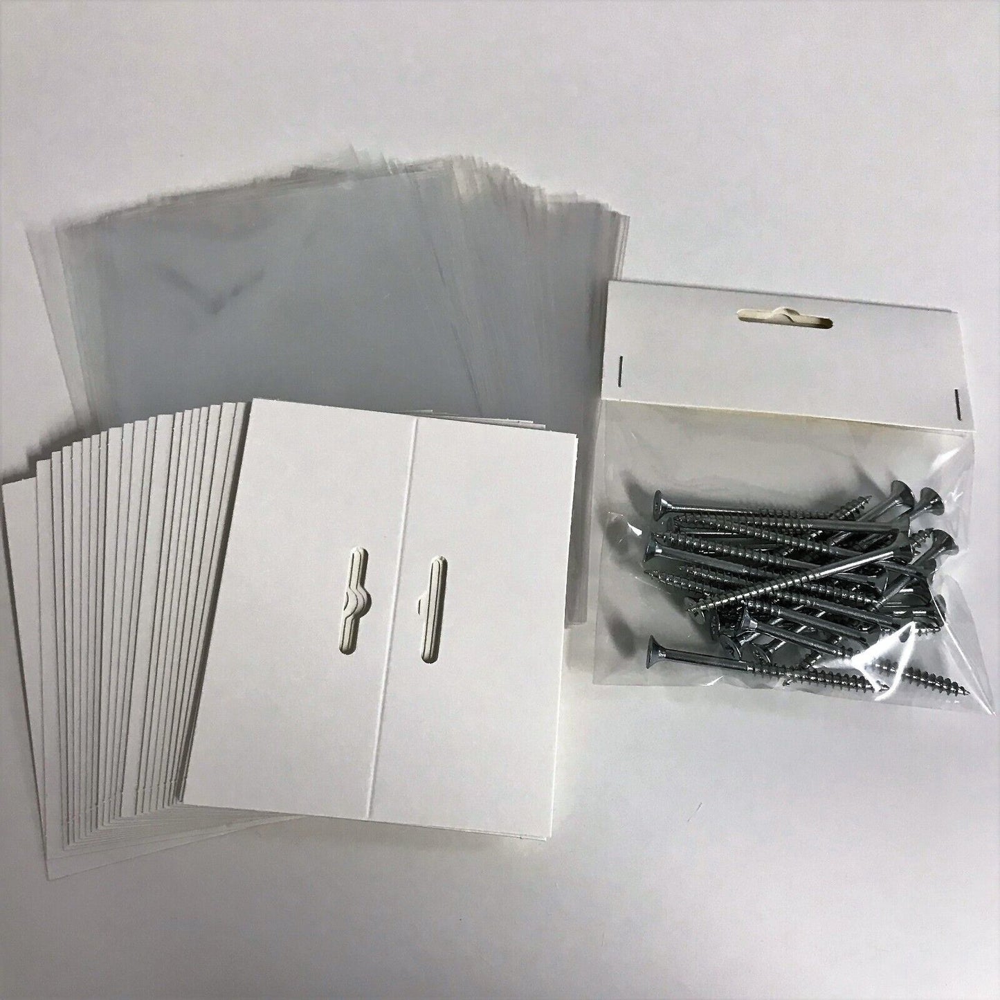 100 Header Cards With Free Bags. Euro Slot, Blank Shop Product Display Packaging